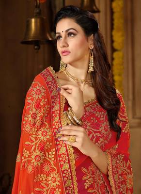 Orange embroidered georgette saree with blouse 2