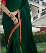 Green plain silk saree with blouse