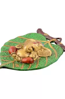 Lord Ganesha in Red Dhoti on Green Leaf Wall Hanging