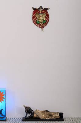 Lord Ganesha in Green Dhoti on Red Leaf Wall Hanging 2