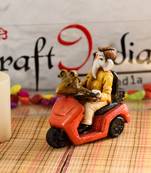 ganesh on scooter figurine