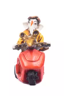 ganesh on scooter figurine