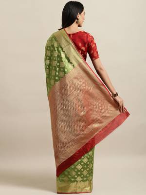 Green woven silk blend saree with blouse 2