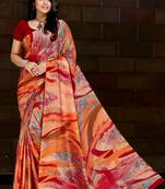 Orange printed satin saree with blouse