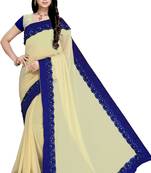 Beige embroidered georgette saree with blouse