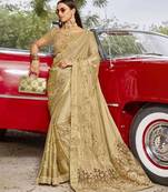 Cream embroidered georgette saree with blouse