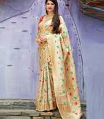 Off white woven banarasi silk saree with blouse