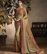 Brown embroidered silk blend saree with blouse