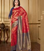 Red woven silk blend saree with blouse