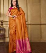 Orange woven silk blend saree with blouse