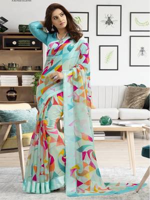 Turquoise printed linen saree with blouse 1