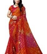 Orange embroidered georgette saree with blouse