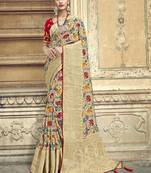 Cream embroidered patola saree with blouse