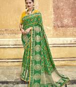 Green embroidered patola saree with blouse