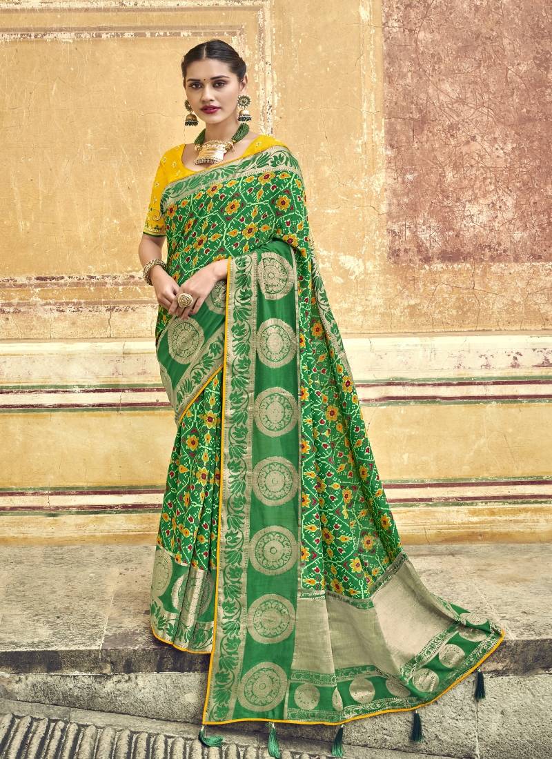 Green embroidered patola saree with blouse