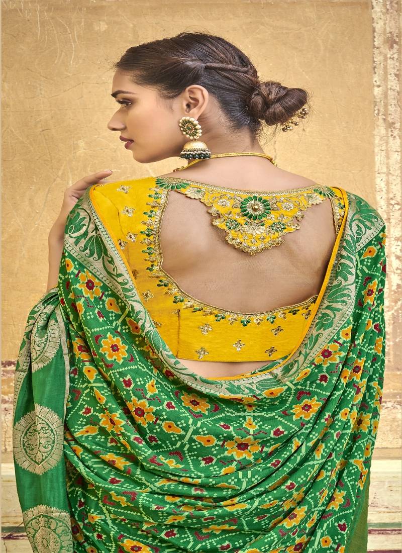 Green embroidered patola saree with blouse