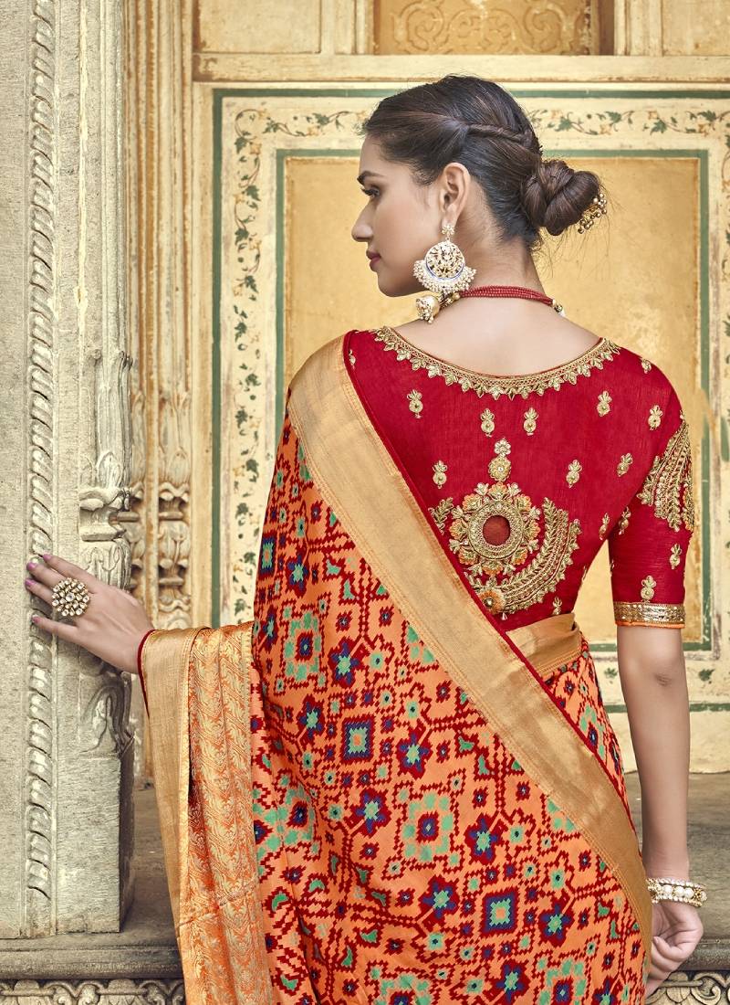 Peach embroidered patola saree with blouse