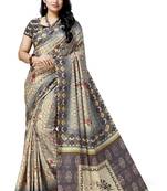 Beige printed tussar silk saree with blouse