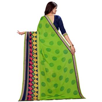 Green printed faux georgette saree with blouse 3