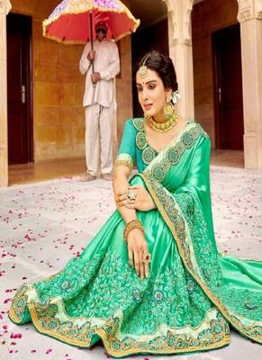   sea green embroidered fancy fabric saree with blouse 2