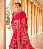 Magenta embroidered fancy fabric saree with blouse
