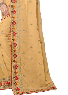 Beige embroidered georgette saree with blouse 4