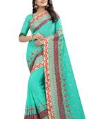 Green embroidered georgette saree with blouse