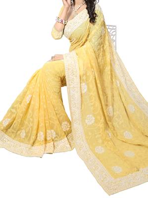 Yellow embroidered georgette saree with blouse 2