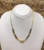 Women'S Alloy Single Line Mangalsutra With Black Beads And Gold Chain Golden Plated Design Vati  Pendant