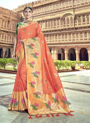 Peach woven patola saree with blouse 1