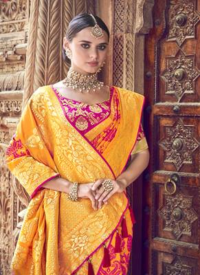 Orange woven patola saree with blouse 2