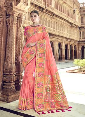 Peach woven patola saree with blouse 1