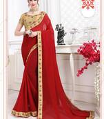 Red embroidered chiffon saree with blouse