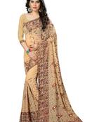 Beige embroidered georgette saree with blouse