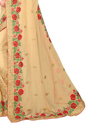 Beige embroidered georgette saree with blouse 4