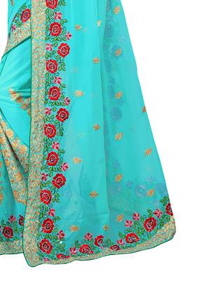 Sky blue embroidered georgette saree with blouse 4