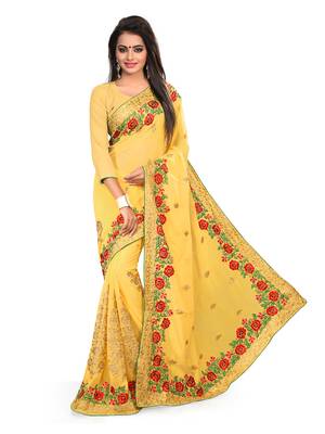 Yellow embroidered georgette saree with blouse 1