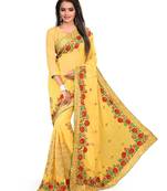 Yellow embroidered georgette saree with blouse