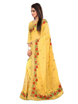 Yellow embroidered georgette saree with blouse 2