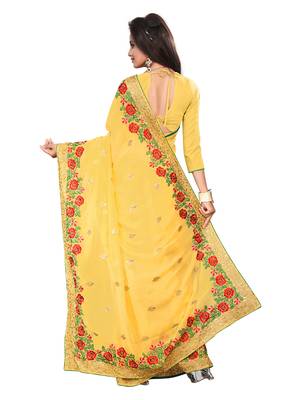 Yellow embroidered georgette saree with blouse 3
