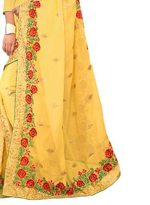 Yellow embroidered georgette saree with blouse 4
