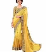 yellow georgette mirror work saree