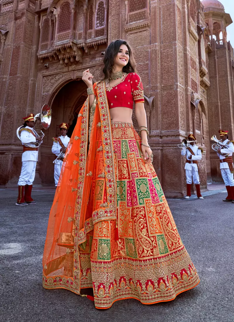 Orange thread embroidery silk semi stitched lehenga