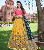 Yellow thread embroidery silk semi stitched lehenga
