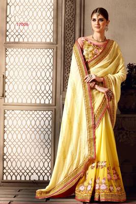 yellow embroidered georgette saree with blouse 1