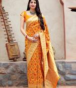 Yellow woven banarasi silk saree with blouse