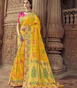 Yellow embroidered silk blend saree with blouse