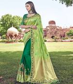 Green embroidered silk blend saree with blouse