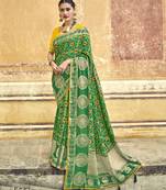 Green embroidered silk blend saree with blouse