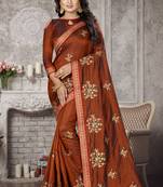 Brown embroidered silk blend saree with blouse